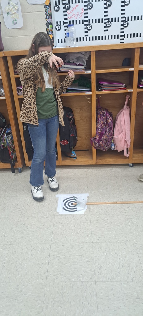5th graders are designing parachutes in science.