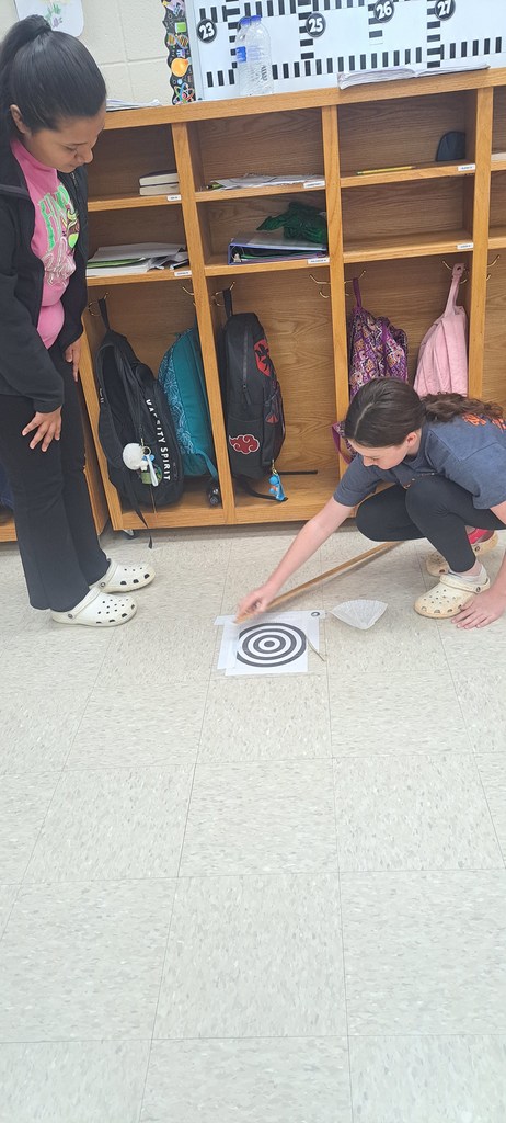 5th graders are designing parachutes in science.