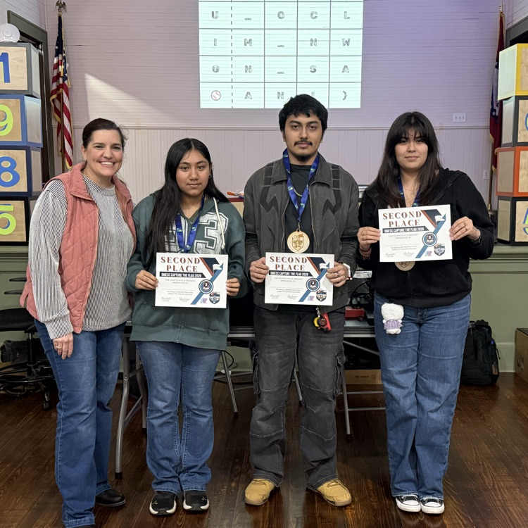 Mrs Williamson with her students who scored 2nd place in the competition