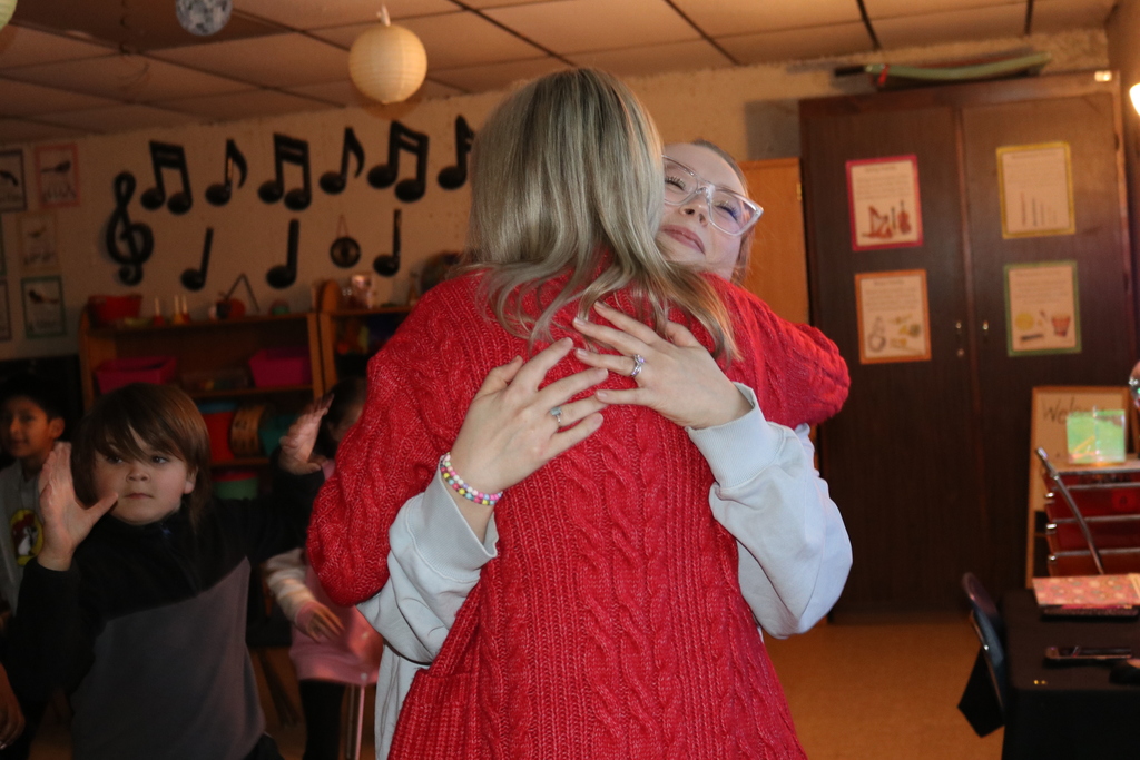 Mrs Smith hugging Mrs Barker