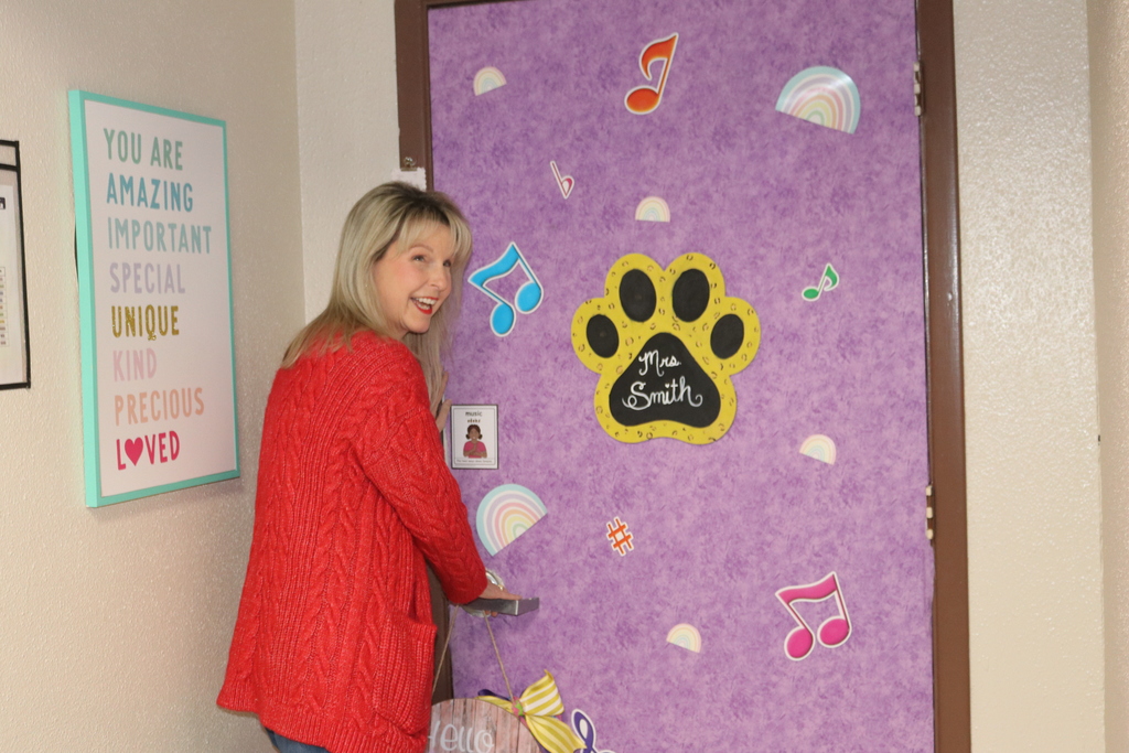 Mrs. Barker getting ready to surprise Mrs. Smith