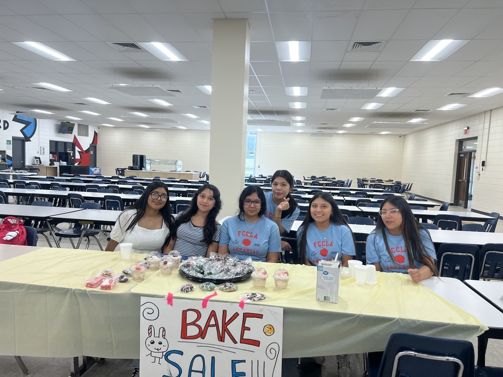 FCCLA members at Parents Make a Difference Night selling their delicious baked goods.