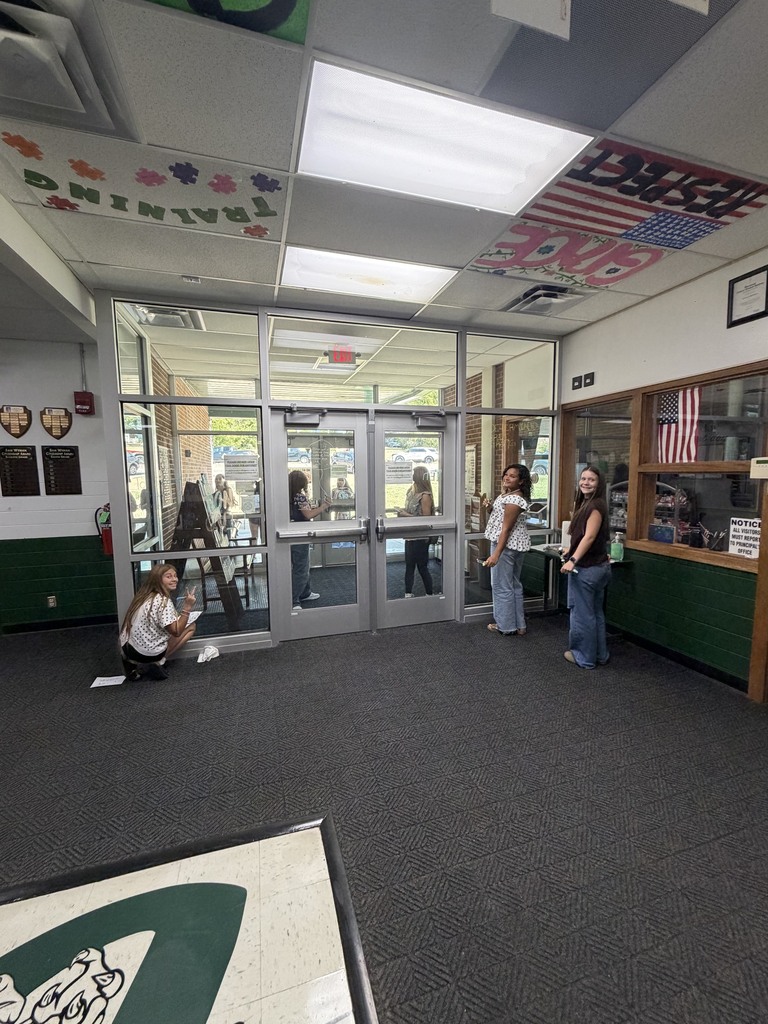 Students working on window art.