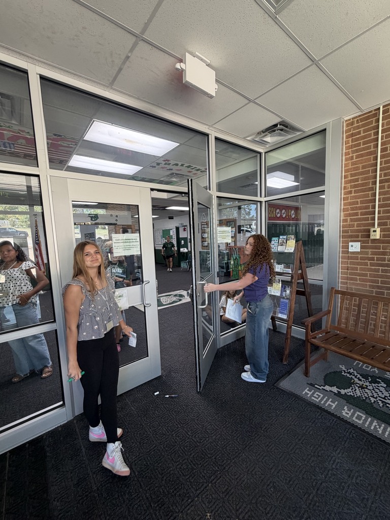 Students working on window art.