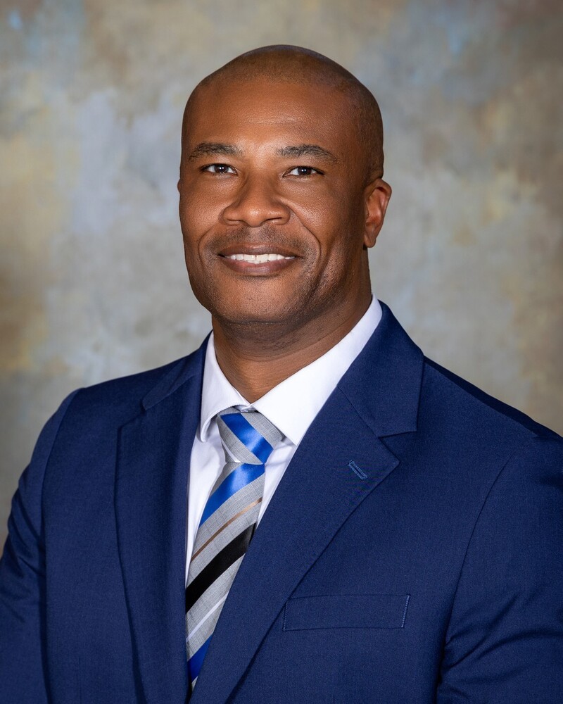 It is an honor and a privilege to serve as the Principal of Austin High School. I am excited to begin my seventh school year alongside our outstanding faculty and staff. As a proud Austin alum, I have a deep connection to the Black Bear community and am passionate about serving the school that helped shape me. I began my career at Austin High School as a teacher and head basketball coach. My love for students, education, and the Austin community eventually led me into school administration.                                                                                                                                                                                                                                        The faculty and staff are committed to providing every student with the tools to be successful in life beyond high school. Whether a student plans to attend college, enter the workforce, pursue a technical career, serve in the military, or follow another path, our goal is to ensure that every Black Bear graduate is prepared for the next chapter of their life.   Together, we will continue to create meaningful learning experiences, build positive relationships, and provide our students with the knowledge, skills, and confidence they need to be successful. Most importantly, I want every member of the Black Bear family to know that Once a Black Bear, Always a Black Bear. And, as I always say: Be Nice and Go Bears!   Mr. Demond Garth