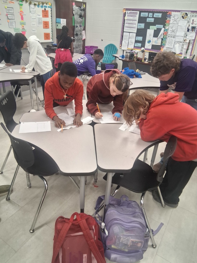 Students working together to solve problems