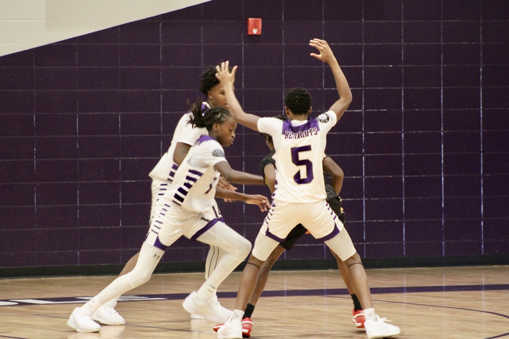 BMS Boys Players playing basketball