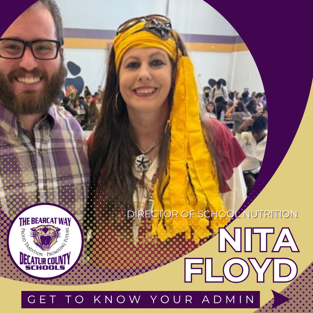 Nita Floyd, Director of School Nutrition, smiles in costume with a colleague during a school event. The image includes the Decatur County Schools logo and the text "Get to Know Your Admin