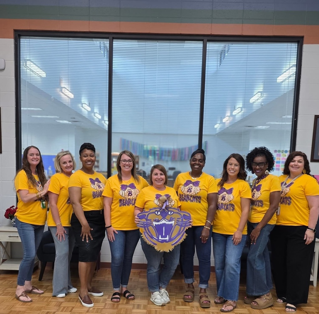 Teachers wearing Bearcat shirts.
