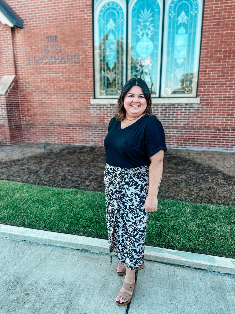 BHS Drama Director stands in front of building at the South Georgis Arts Symposium