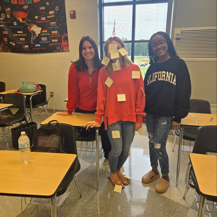 Students in Mrs. Wallace's Spanish 1 class reviewed the body parts by labeling their classmates using the Spanish words. 