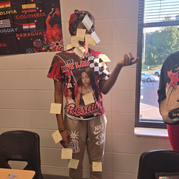 Students in Mrs. Wallace's Spanish 1 class reviewed the body parts by labeling their classmates using the Spanish words. 