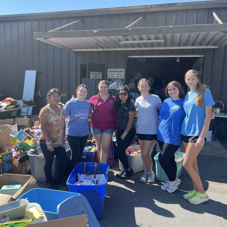 Anchor Club members volunteered at the Salvation Army helping sort donations. 