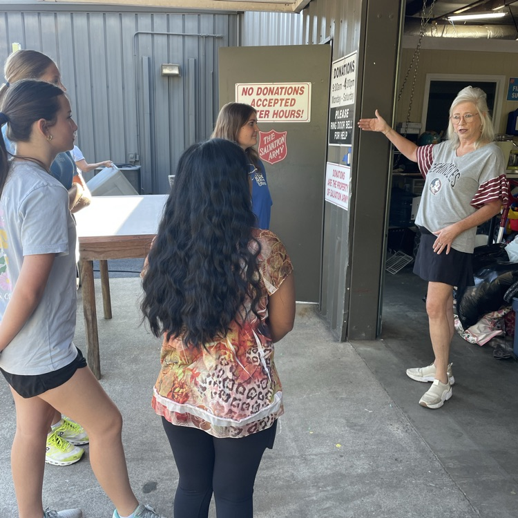 Anchor Club members volunteered at the Salvation Army helping sort donations. 