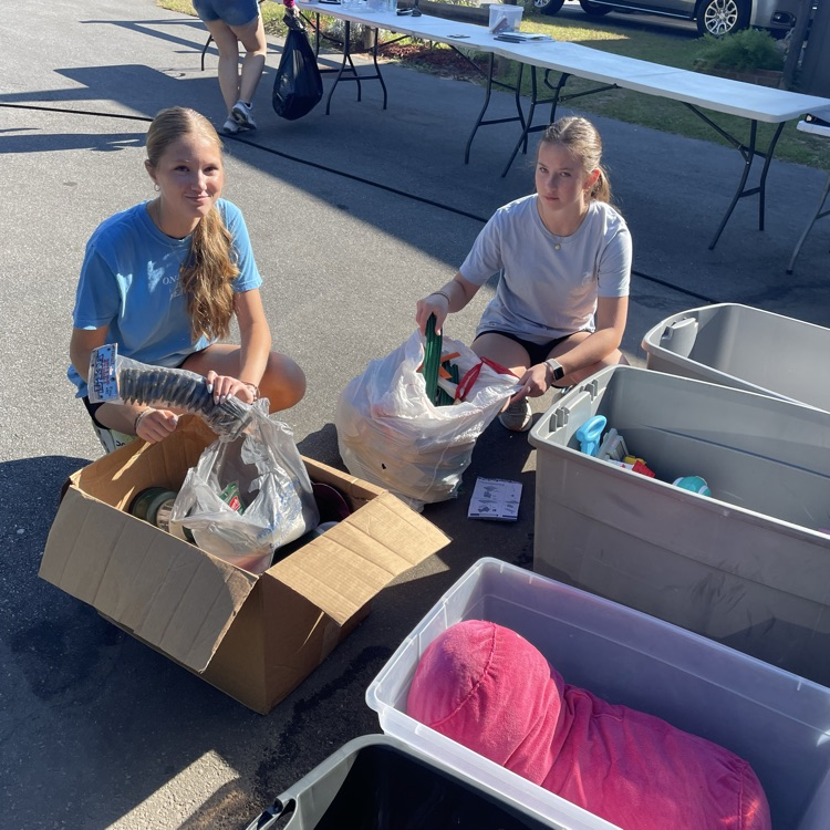Anchor Club members volunteered at the Salvation Army helping sort donations. 
