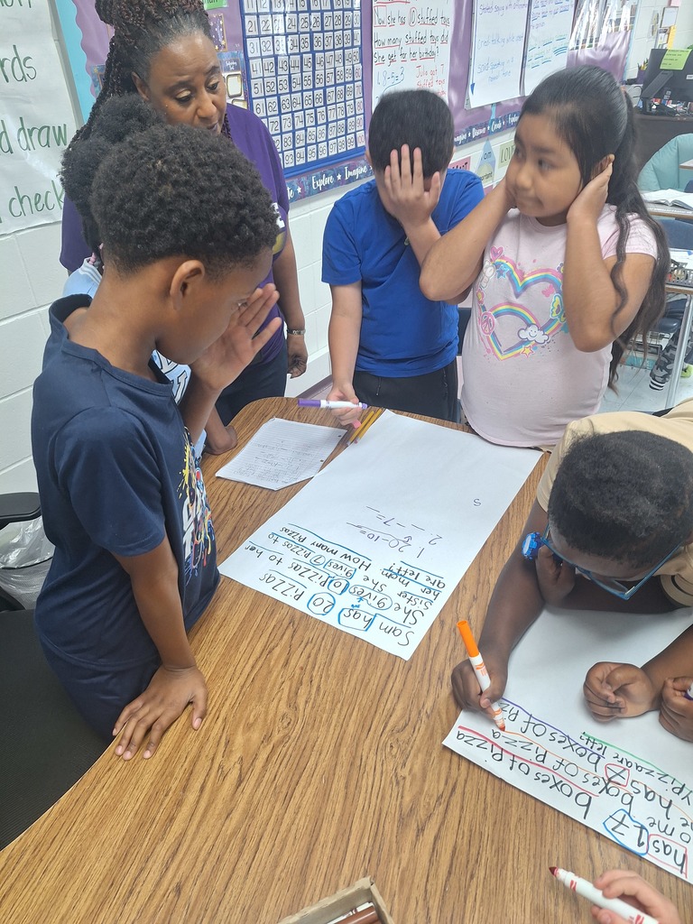 4 students work at a table