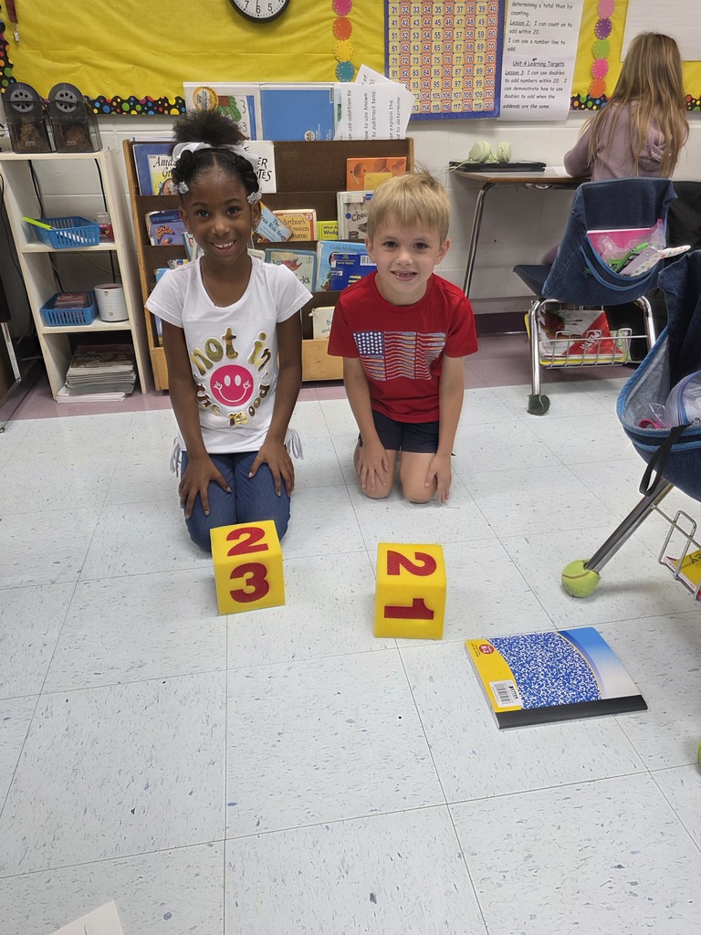 2 students using extra large dice