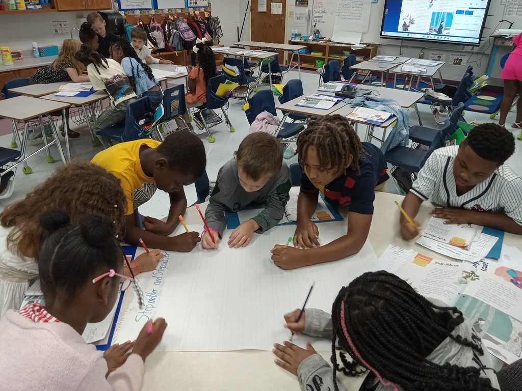 picture of a group of students working at a table