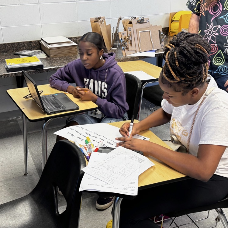 Mrs. Harrell's Foundations of Algebra students created a two-step word problem, drew a graph, and made a table of ordered pairs with partners.