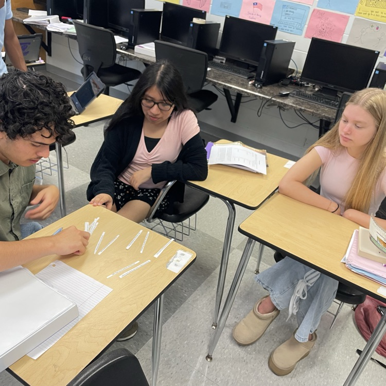AP Lit students piece together a poem to help them understand the structure of a sonnet.