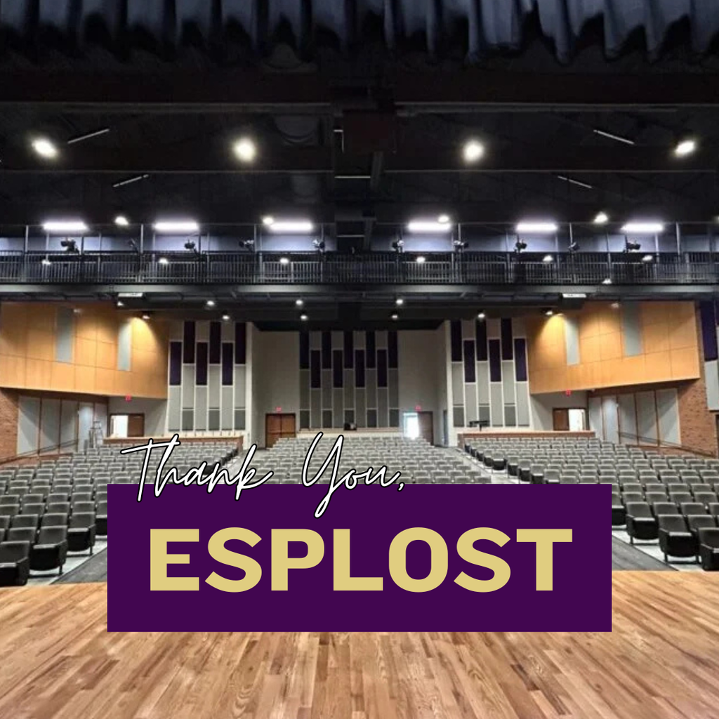 An empty modern school auditorium with rows of gray seats, wood flooring, and acoustic panels on the walls. A purple and gold graphic on the image reads “Thank You, ESPLOST.