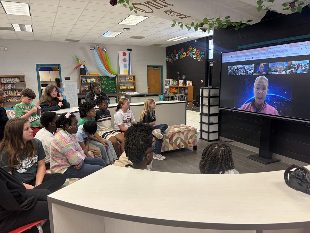 Students in the media center at Hutto Elementary wait to ask questions as representatives of their school during this week's Direct to Discovery Session.