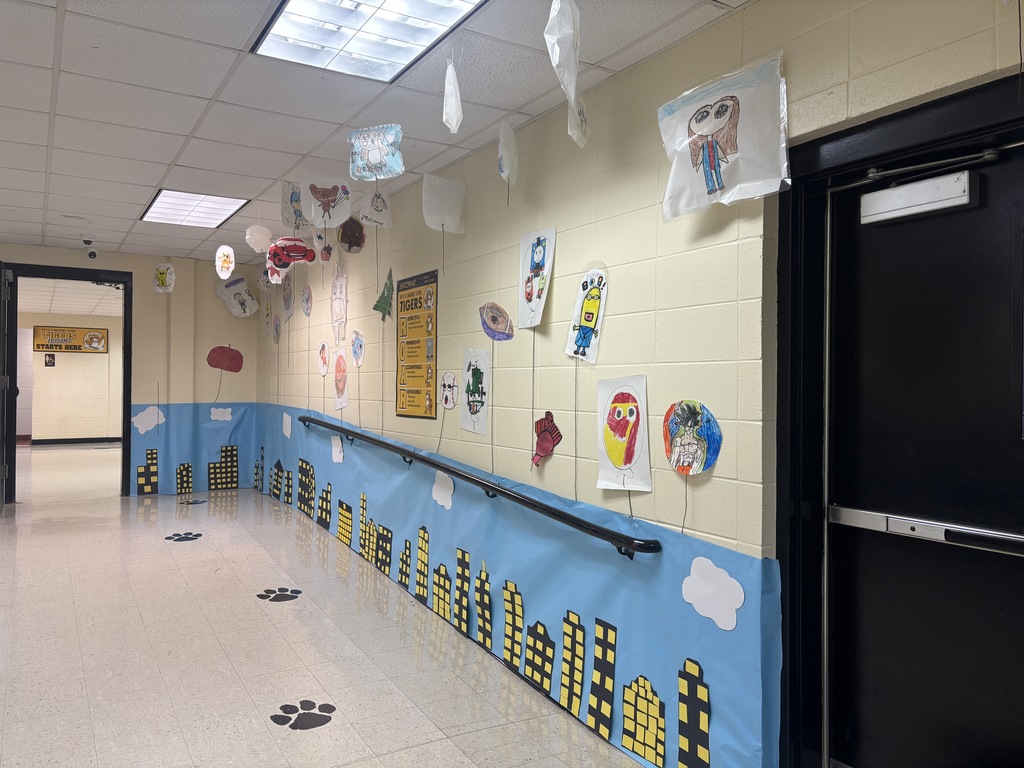This image contains images of balloons students made for the hallway.