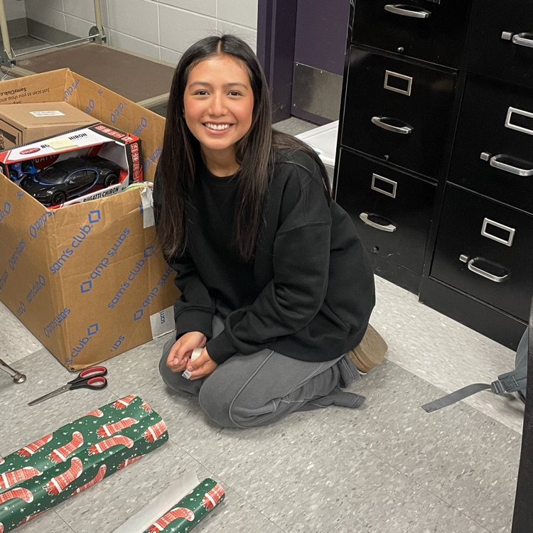 Anchor Club members were busy wrapping gifts this afternoon to deliver to the students at the Friendship House  this week. 