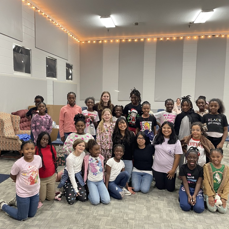 Anchor Club members Angelica DeJesus, Angie Dominguez, Anna Carnes, and Yuliana Avila-Hernandez delivered gifts at the Friendship House today. 