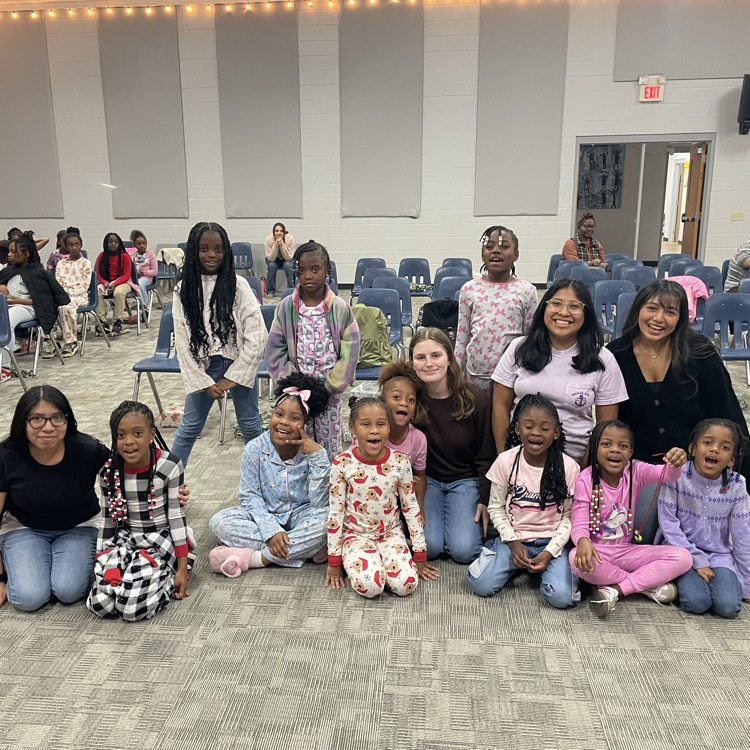 Anchor Club members Angelica DeJesus, Angie Dominguez, Anna Carnes, and Yuliana Avila-Hernandez delivered gifts at the Friendship House today. 