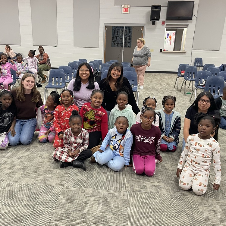 Anchor Club members Angelica DeJesus, Angie Dominguez, Anna Carnes, and Yuliana Avila-Hernandez delivered gifts at the Friendship House today. 