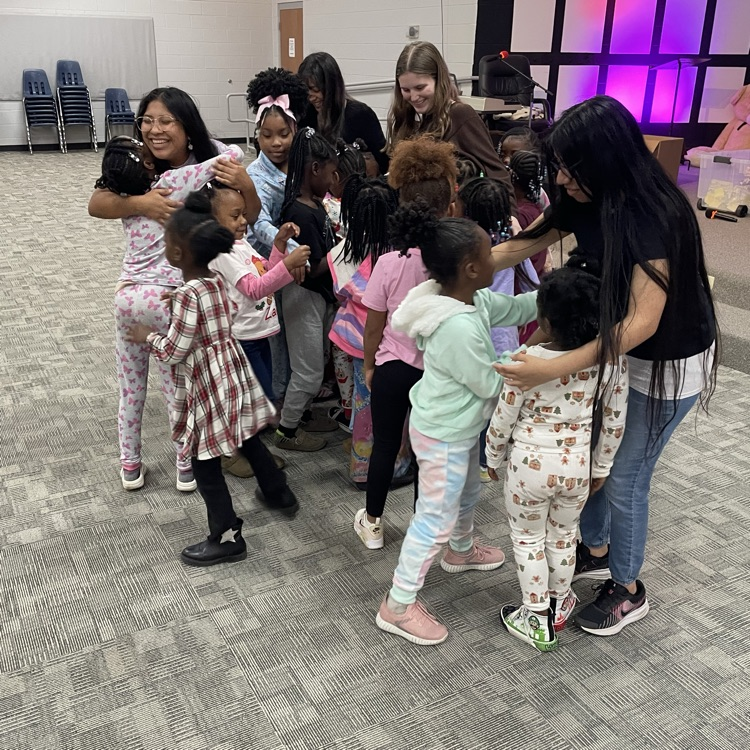 Anchor Club members Angelica DeJesus, Angie Dominguez, Anna Carnes, and Yuliana Avila-Hernandez delivered gifts at the Friendship House today. 