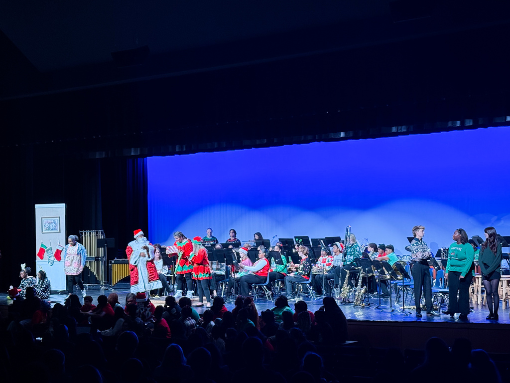 Drama Students performing an adaption of Twas the Night Before (the Night Before) Christmas