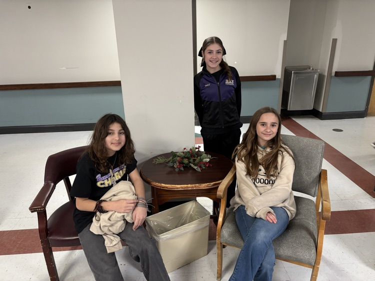 3 seventh grade chorus students posed for a picture