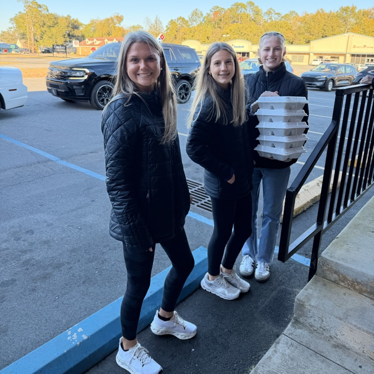 Anchor Club and Key Club members helped the Salvation Army distribute almost 600 meals as part of Supper on Scott tonight.