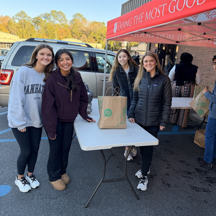 Anchor Club and Key Club members helped the Salvation Army distribute almost 600 meals as part of Supper on Scott tonight.