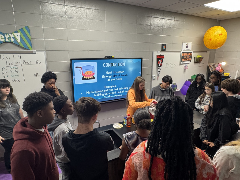 8th grade students teach younger students a lesson on energy.