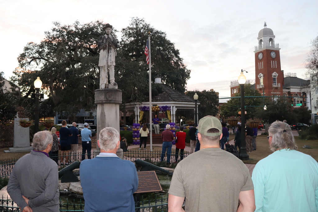 Community members gather in Downtown Bainbridge for the Coach DuBose Meet and Greet
