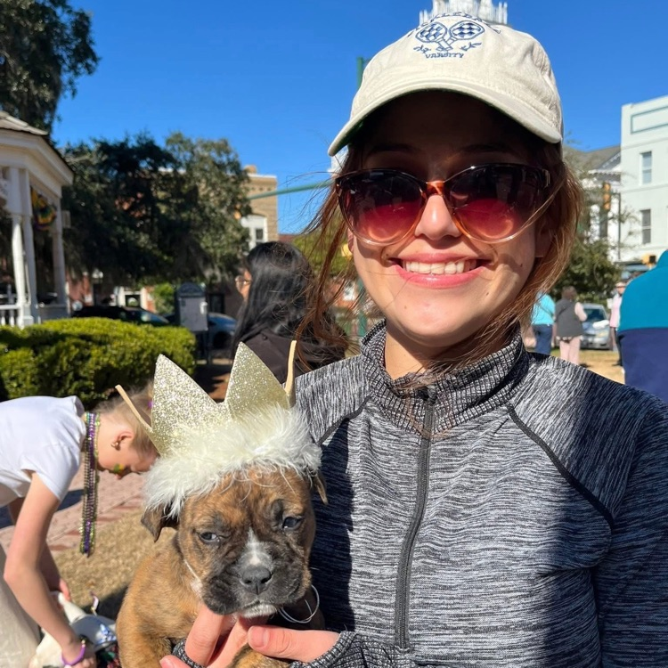 Anchor members Gambler Dollar, Angelica DeJesus, Angelina Gomez-Roman and Anna Carnes helped walk Humae Society dogs in the Barkus Parade to encourage people to adopt.