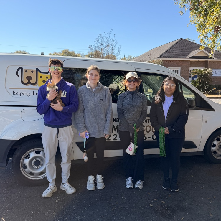 Anchor members Gambler Dollar, Angelica DeJesus, Angelina Gomez-Roman and Anna Carnes helped walk Humae Society dogs in the Barkus Parade to encourage people to adopt.