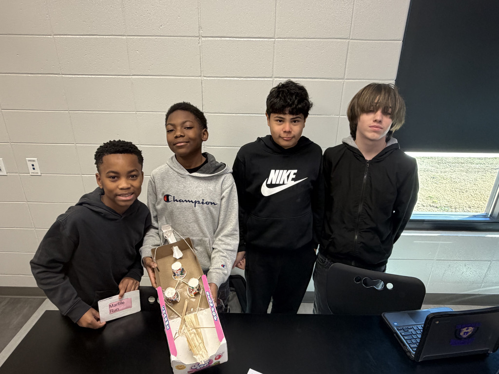 Mr. Perry's ELT students with their Marble Run. 