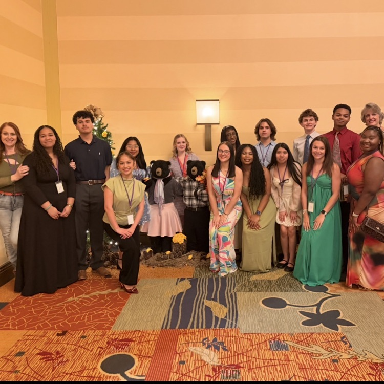 Anchors pose before the Saturday night Banquet. 