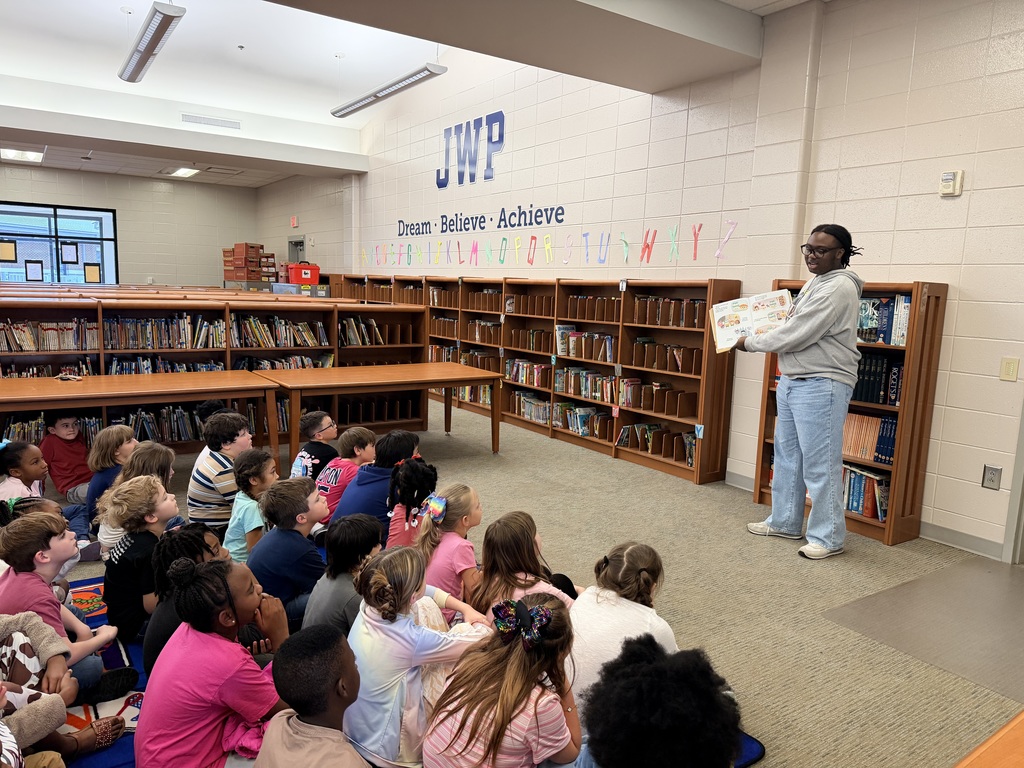 BHS Drama Club students reading to 2nd Graders