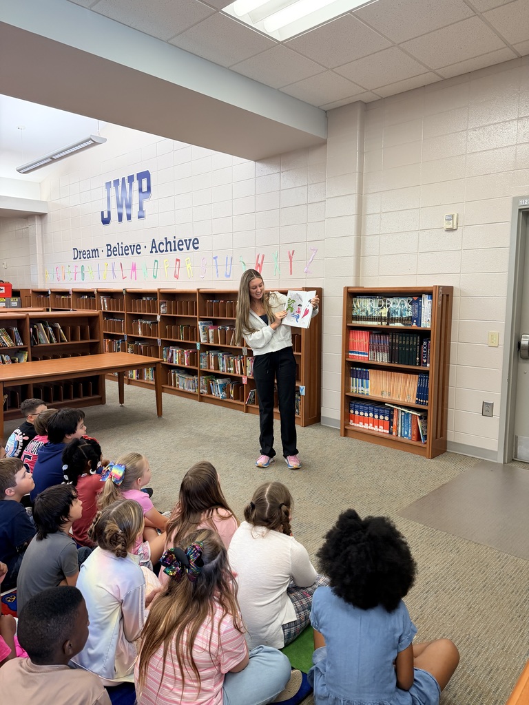 BHS Drama Club students reading to 2nd Graders