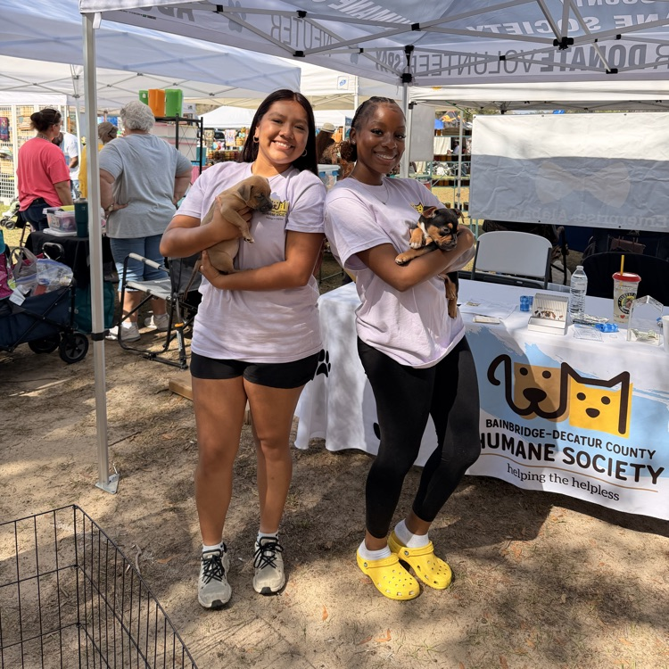 Anchor Club members helped with a Humane Society adoption event at Rivertown Days. 
