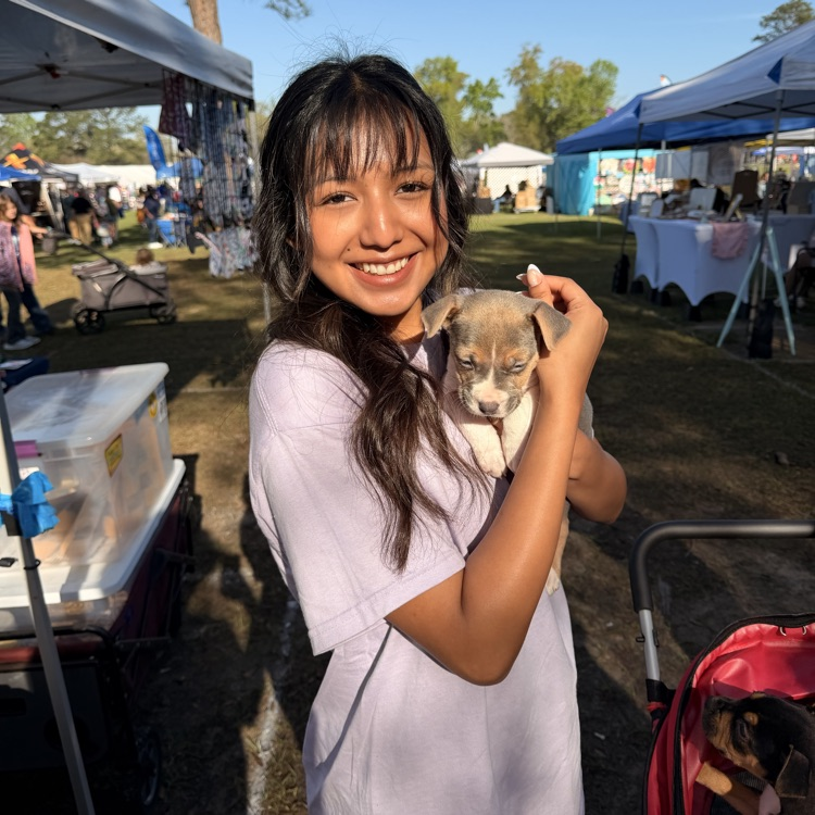 Anchor Club members helped with a Humane Society adoption event at Rivertown Days. 