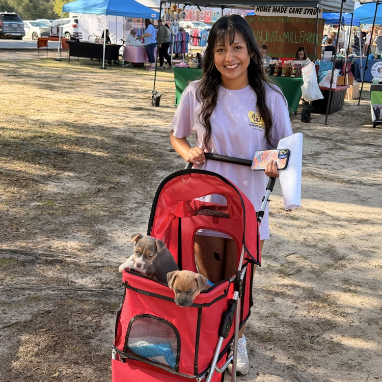 Anchor Club members helped with a Humane Society adoption event at Rivertown Days. 