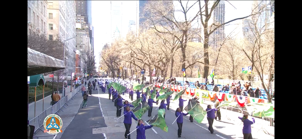 Bainbridge High School band marches in the NYC St. Patrick’s Day Parade holding a Bainbridge banner.