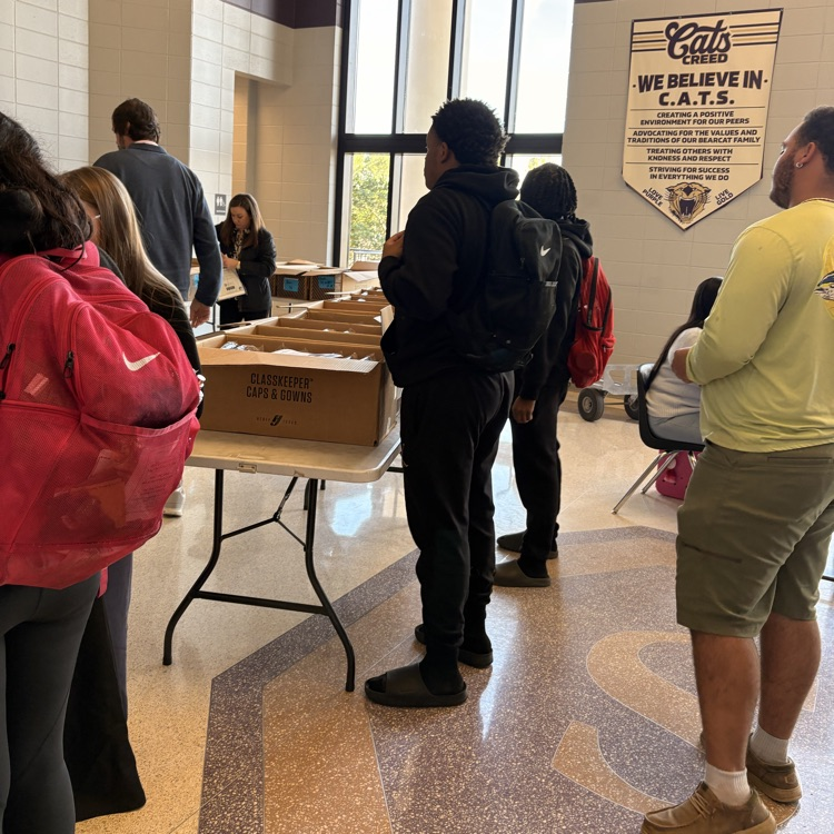 Seniors picked up the caps and gowns today