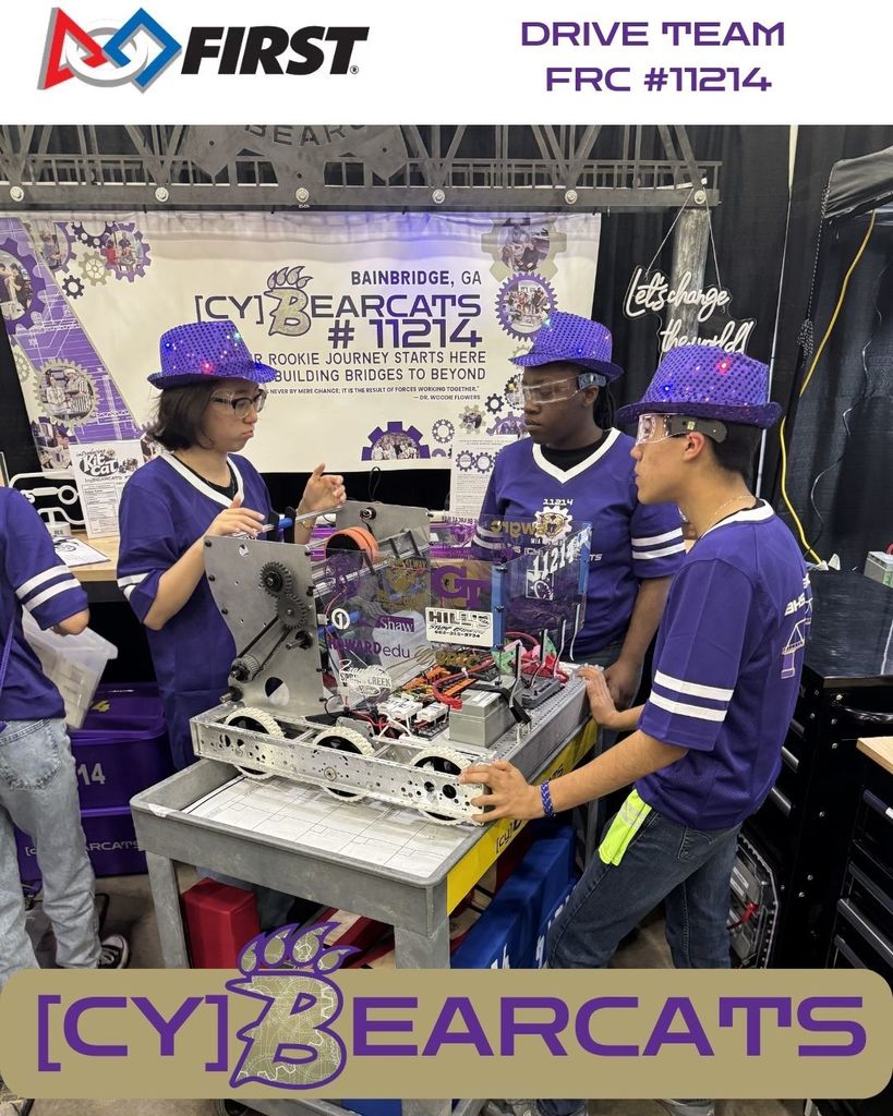 [CY]BEARCATS team discussing strategy in the PITS during competition. Come learn more about the game!